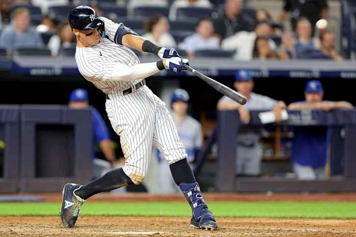 Jul 28, 2022; Bronx, New York, USA; New York Yankees center fielder Aaron Judge (99) hits a walk-off solo home run during the bottom of the ninth inning against the Kansas City Royals at Yankee Stadium.